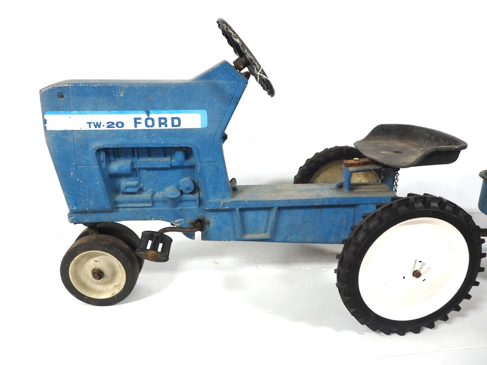 Ertl Ford TW20 pedal tractor with trailer | Proxibid