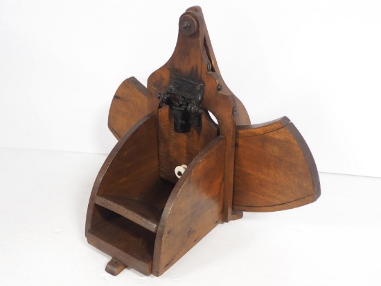 Primitive wooden vegetable slicer