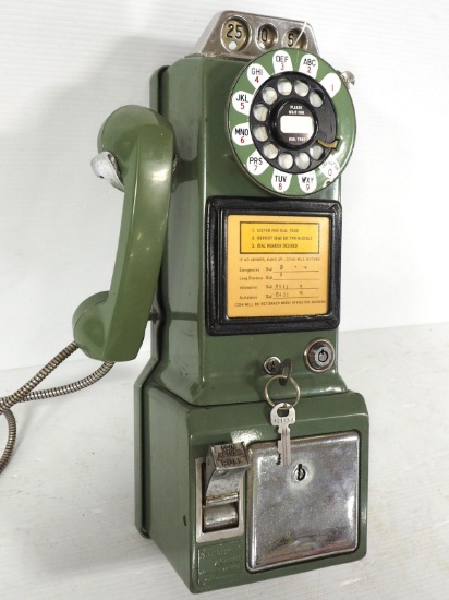 Green coin-operated pay phone