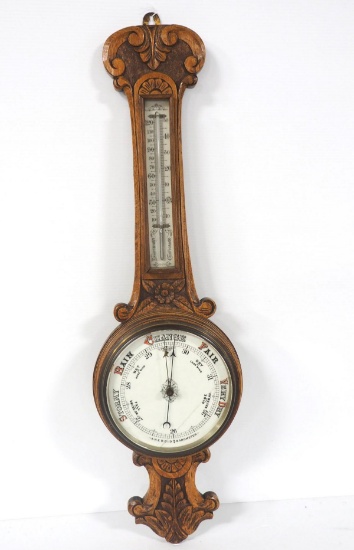 Early carved oak barometer