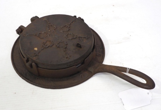 Cast iron waffle iron marked 7 & 8