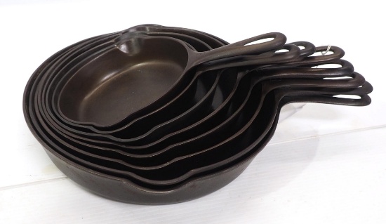Set of 8 Griswold "large logo" cast iron skillets