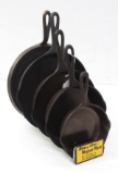 Wagner skillet display rack with 5 pieces