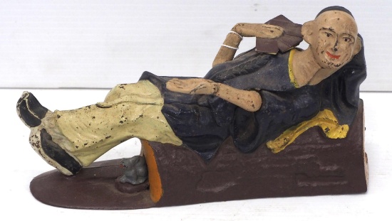 "Reclining Chinaman" mechanical bank