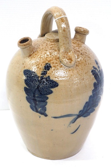 Decorated crock jug with 2 spouts