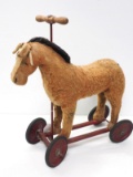 Ride-on horse on wheels