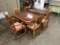 WALNUT DINING TABLE W/ (3) LEAVES, (4) SIDE CHAIRS & CAPTAIN'S CHAIR