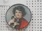 ANTIQUE CIRCULAR METAL PICTURE - GIRL W/ PUPPIES