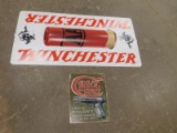 PLATIC WINCHESTER AA SHELL SIGN & A TIN COLT REVOLVERS & AUTO PISTOLS SIGN