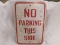 NO PARKING THIS SIDE - METAL SIGN