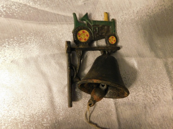 SMALL CAST IRON JOHN DEERE TRACTOR DINNER BELL