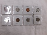 8 FOREIGN COINS