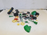 BAG OF VARIOUS TOY TRACTOR PARTS