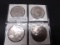 4 PACK OF DIFFERENT IKE DOLLARS