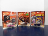 (3) JOHNNY LIGHTNING SUPER HEROS DIE CAST CARS W/ MATCHING TRADING CARD