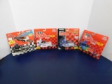 (4) RACING CHAMPIONS 1:87 SCALE TEAM TRANSPORTERS