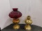 (2) BRASS OIL LAMP BASES W/CHIMNEYS & ONE RUBY RED SHADE