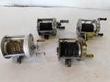 (4) BAIT CASTING FISHING REELS