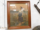 FRAMED PRINT OF FARM WOMAN W/ SCYTHE STANDING IN FIELD