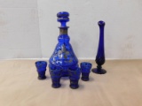 COLBALT BLUE DECANTER W/ 4 CUPS & BLUE BUD VASE