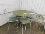 ROUND WROUGHT IRON TABLE W/ 4 CHAIRS