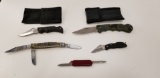 (4) VARIOUS POCKET KNIVES - 2 W/ CANVAS HOLSTERS