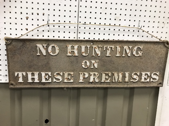 CAST IRON "NO HUNTING ON THESE PREMISES" SIGN