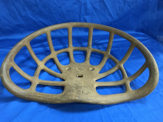 UNKNOWN CAST IRON IMPLEMENT / TRACTOR SEAT