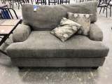 BROWN UPHOLSTERED LOVE SEAT