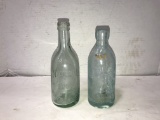 (2) ANTIQUE SODA BOTTLES