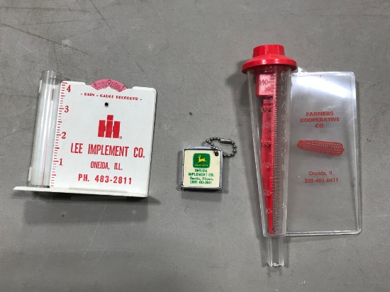 (2) ONEIDA ILLINOIS ADVERTISING RAIN GAUGES & TAPE MEASURE