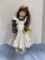 20 IN PORCELAIN DOLL W STAND
