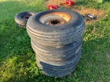 (4) 8.5L X 14 IMPLEMENT TIRES ON 6 BOLT RIMS