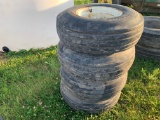 (4) 9.5L X 14 IMPLEMENT TIRES ON 6 BOLT RIMS