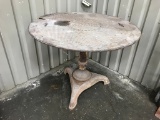 ROUND CAST IRON TABLE MADE WITH MANHOLE COVER