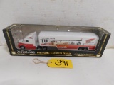 ERTL WHIRE GMC DIE CAST CAB WITH TRAILER