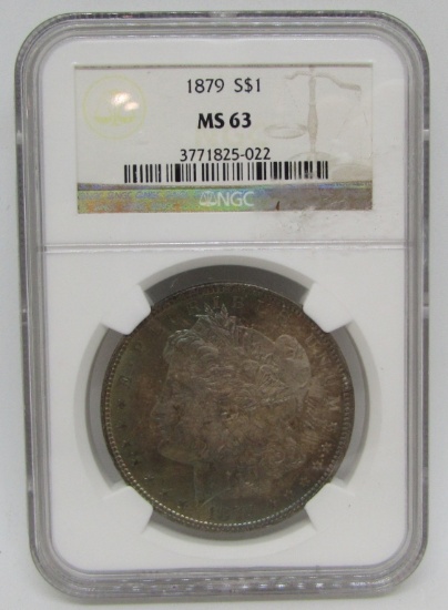 1879 MORGAN SILVER DOLLAR MS 63 NGC. RAINBOW
