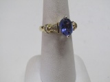 18K GOLD TANZANITE DIAMOND RING.