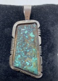 SIGNED NAVAJO SPIDERWEB TURQUOISE STERLING PENDANT