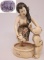 SIGNED CARVED NETSUKE MOTHER POLYCHROME FOSSIL