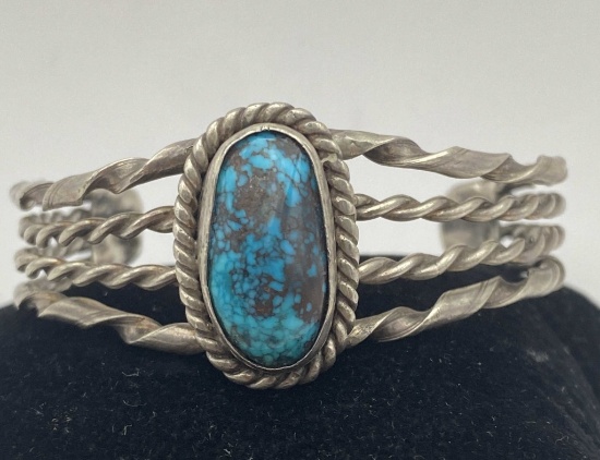 SPIDERWEB TURQUOISE STERLING NAVAJO BRACELET