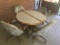 Round, Farm Style, Well Worn Table and Four Chairs