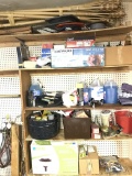 Shelves Pictured with Panting Supplies, Wiper Fluid, Gloves and More