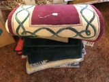 Large Stack of Rugs