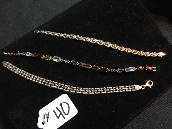 (2) Sterling  Bracelets + Unmarked Multi-Settings Bracelet  (14 grams)