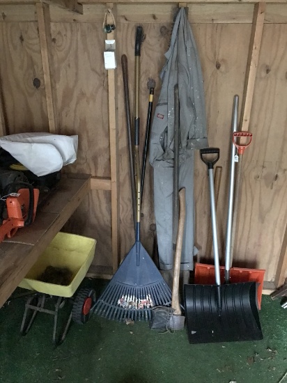 Shed Lot Of Yard Tools: Axe, Snow Shovels, Rakes, Pitch Fork, & Coveralls