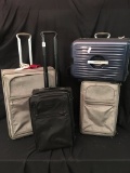 Lot Of (4) Tumi Suitcases On Wheels W/Handles