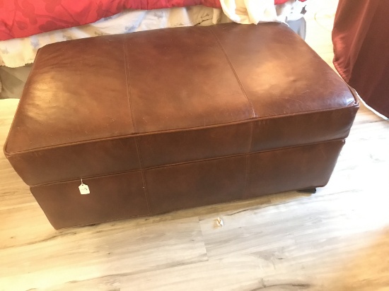 Leather Lift lid Storage Ottoman Is 27" x 42" x 18"T.