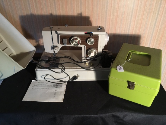 Older Sewing Machine In Case