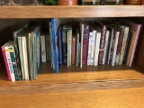 Shelf Of Books With Various Topics